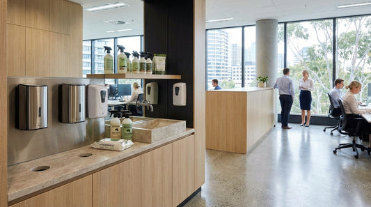Workplace hygiene products including hand soap dispensers and sanitiser stations in a commercial Australian office facility