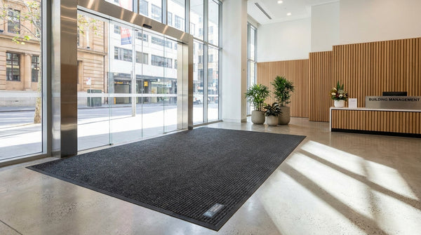 Commercial entrance mat in Australian office building lobby, anti-slip safety floor mat at entry