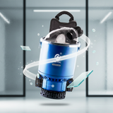 Blue vacuum cleaner with a transparent dust compartment on a blurred background